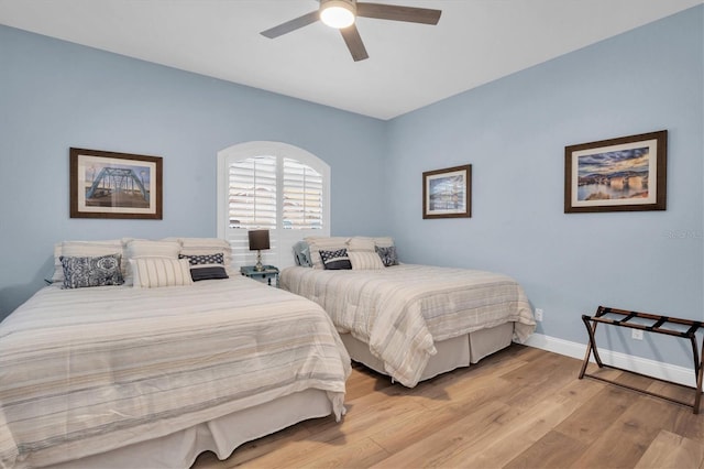 bedroom featuring ceiling fan and light hardwood / wood-style floors