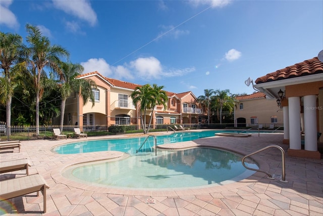 view of pool featuring a patio