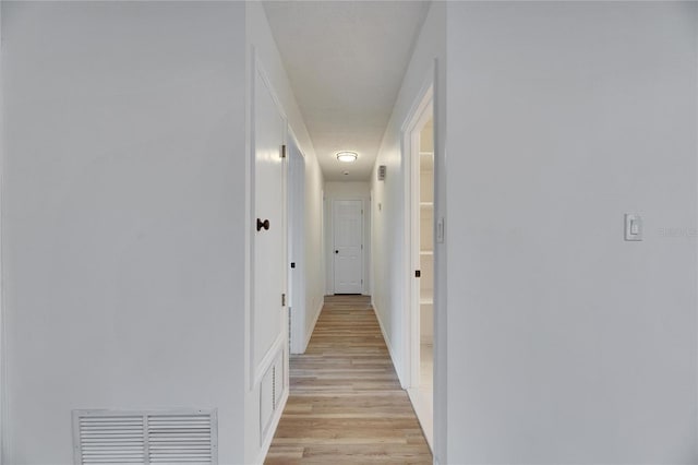 hall featuring light hardwood / wood-style flooring