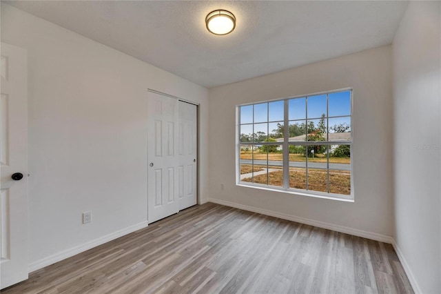 empty room featuring light hardwood / wood-style flooring