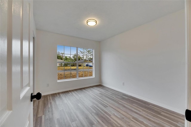 empty room featuring light wood-type flooring