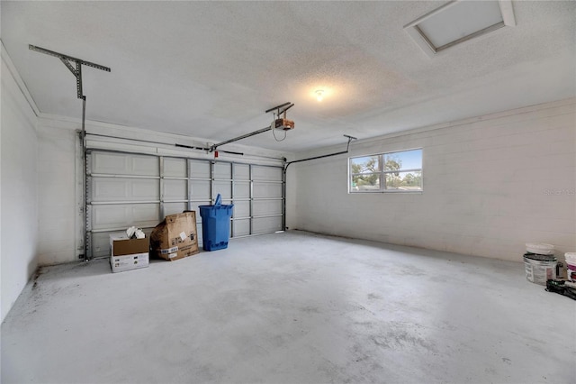 garage featuring a garage door opener