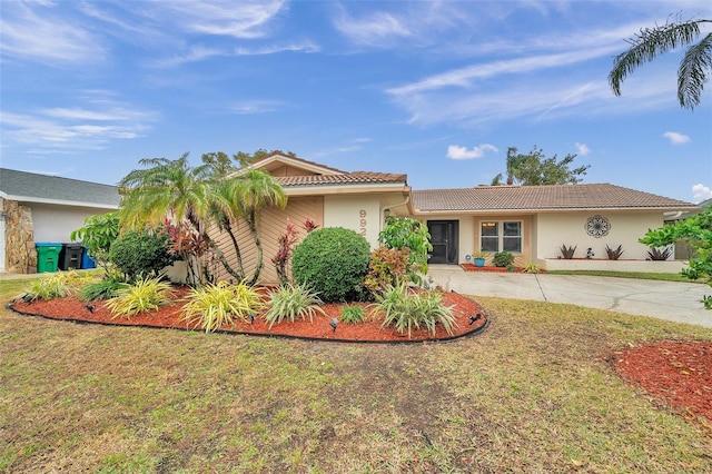 view of front of home with a front yard