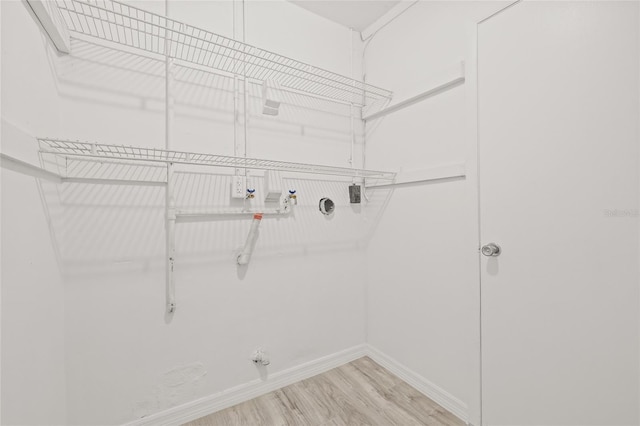 washroom with light hardwood / wood-style floors