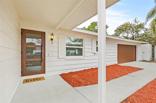 entrance to property with a garage