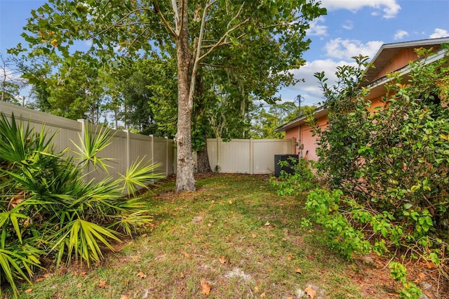 view of yard with central AC