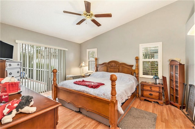 6009 County Line Rd, Spring Hill, FL 34606 - bedroom with a ceiling fan, access to exterior, wood finished floors, and lofted ceiling