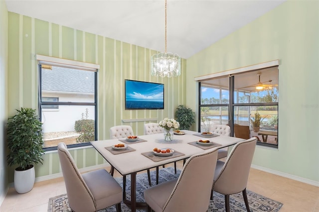 dining space with a chandelier and light tile patterned floors