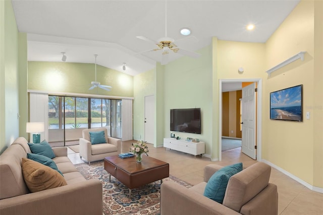 living room with high vaulted ceiling, light tile patterned floors, and ceiling fan