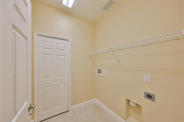washroom with hookup for an electric dryer, baseboards, visible vents, washer hookup, and laundry area