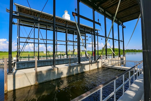 view of dock with a water view