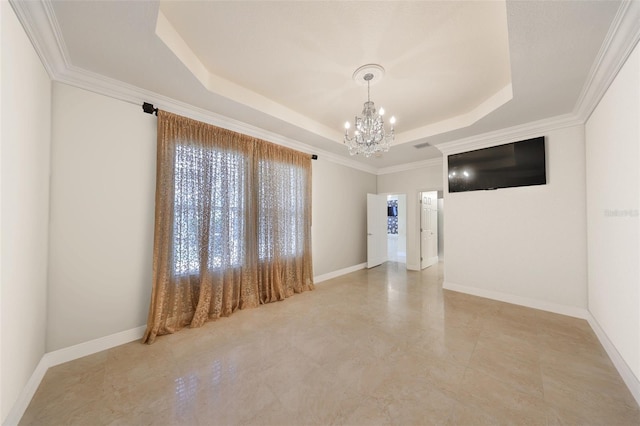 unfurnished room with baseboards, a chandelier, and a raised ceiling