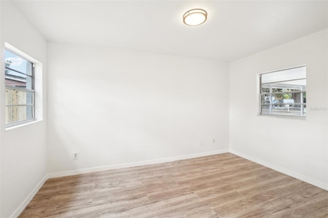 empty room with light wood-type flooring