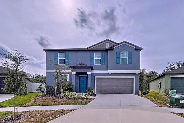 front of property featuring a garage