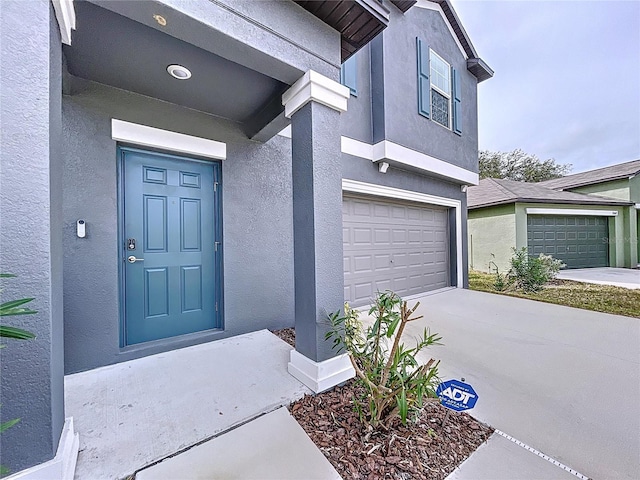 property entrance featuring a garage