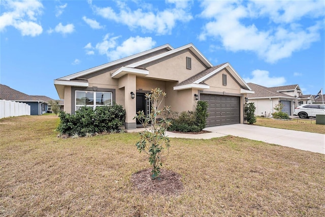 ranch-style house with a garage and a front lawn