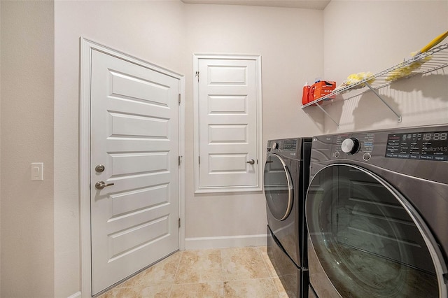 laundry area with washer and dryer