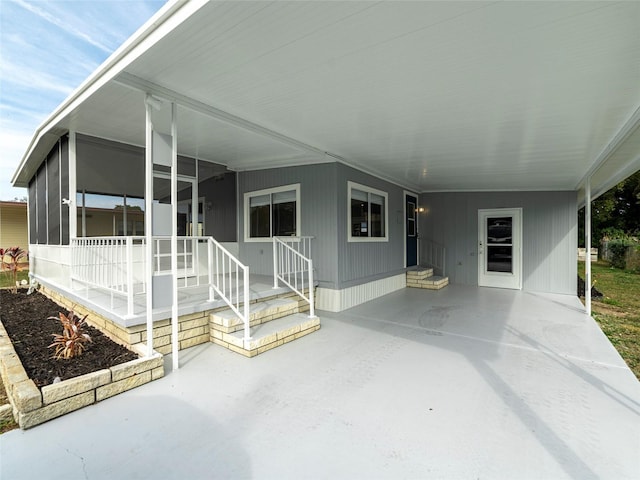 exterior space with a carport