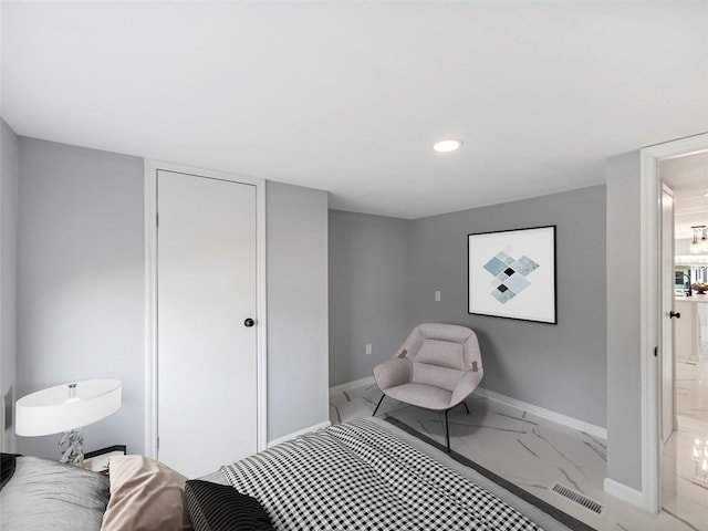 bedroom featuring recessed lighting, marble finish floor, visible vents, and baseboards