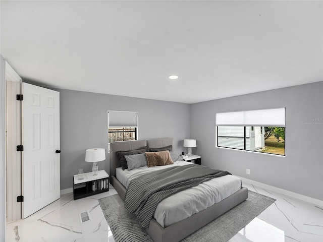 bedroom featuring marble finish floor, baseboards, and recessed lighting