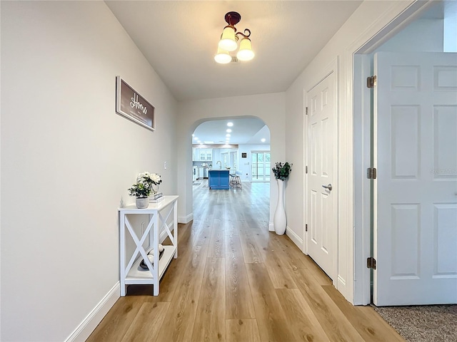 hall featuring light wood-type flooring