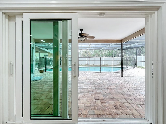 view of pool featuring ceiling fan