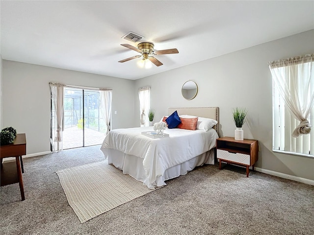 bedroom featuring ceiling fan, access to exterior, and carpet