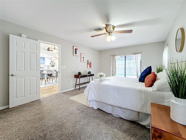 carpeted bedroom featuring ceiling fan