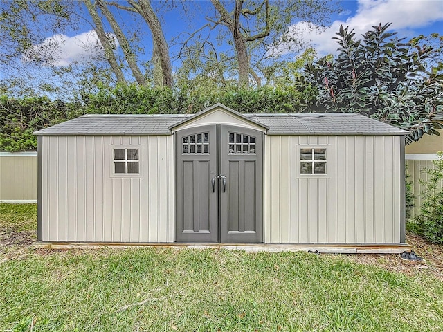 view of outdoor structure featuring a yard