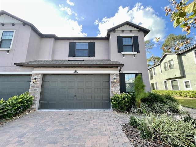 view of front of property with a garage