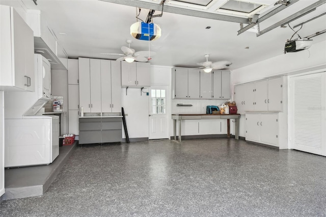 garage with a ceiling fan and a garage door opener