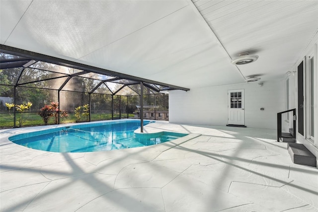 pool with a patio area and a lanai