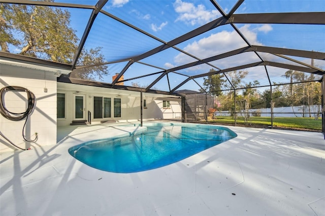 view of swimming pool with a lanai, a fenced in pool, and a patio