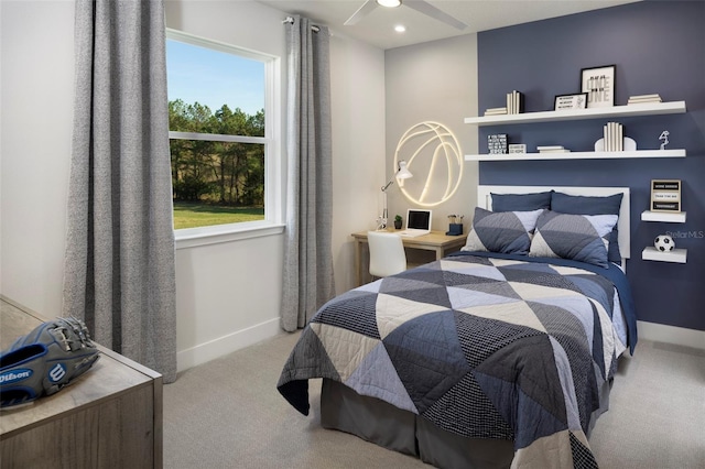 carpeted bedroom with ceiling fan