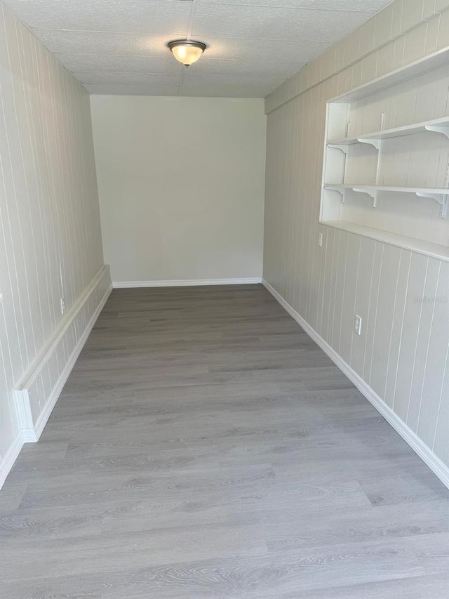 unfurnished room featuring hardwood / wood-style flooring