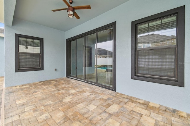 view of patio / terrace with ceiling fan