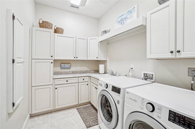 clothes washing area featuring separate washer and dryer, sink, cabinets, light tile patterned floors, and ceiling fan