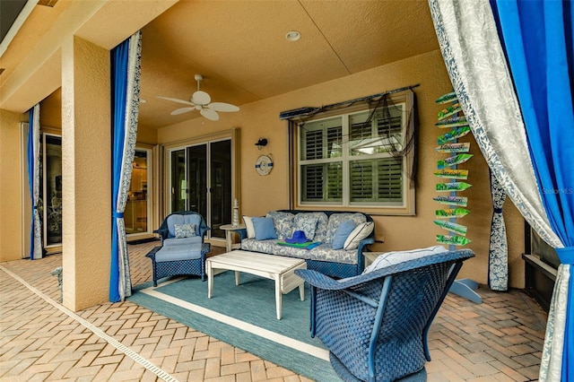 view of patio featuring an outdoor hangout area and ceiling fan