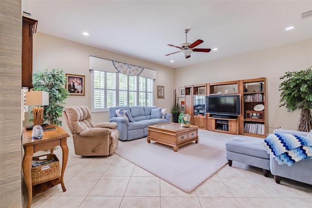 tiled living room featuring ceiling fan