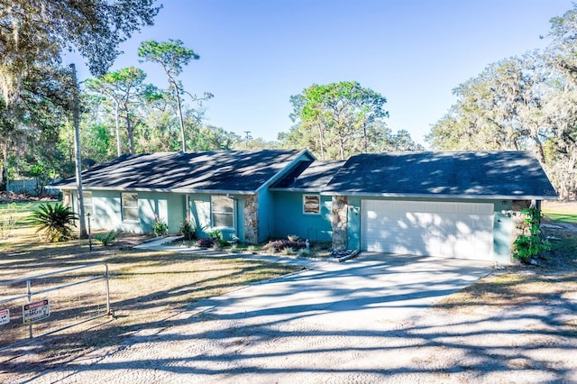 single story home with a garage