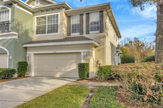 view of front of property with a garage