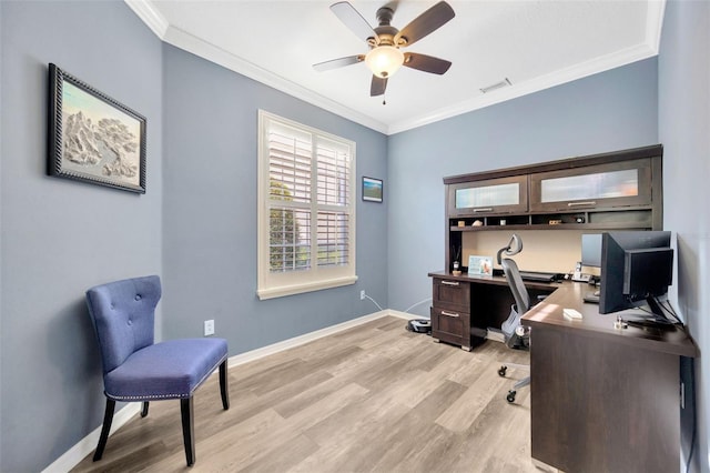 office space with light hardwood / wood-style floors, ceiling fan, and ornamental molding