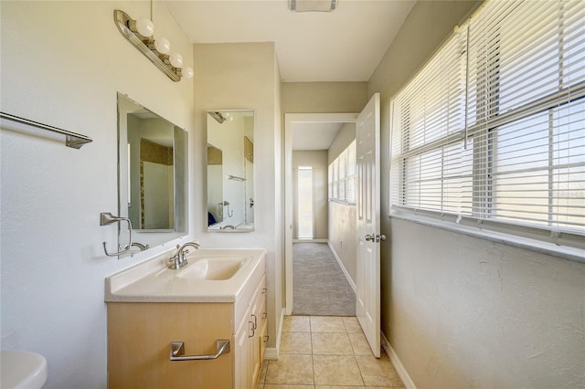 bathroom featuring vanity and tile patterned flooring