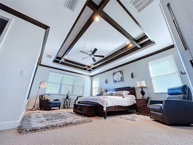 bedroom with a textured ceiling, ornamental molding, ceiling fan, and carpet flooring