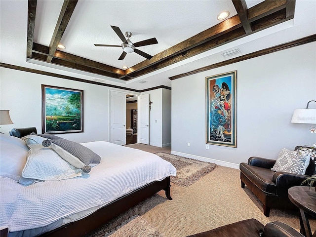 bedroom with a tray ceiling, crown molding, ceiling fan, and carpet flooring