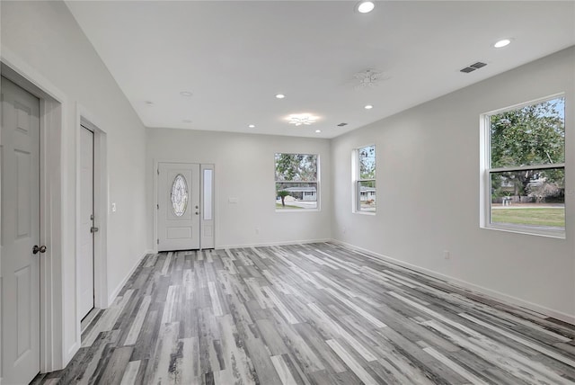 interior space with light hardwood / wood-style floors