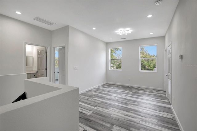 empty room featuring light hardwood / wood-style floors