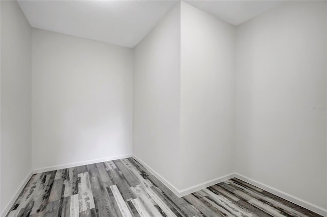 spare room with light hardwood / wood-style flooring