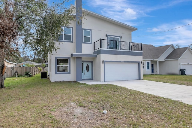 view of front of property featuring a garage, a balcony, central AC unit, and a front lawn