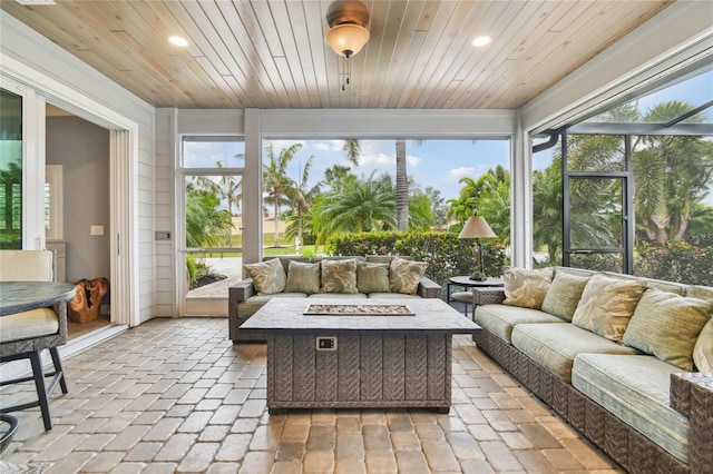 sunroom / solarium with wood ceiling